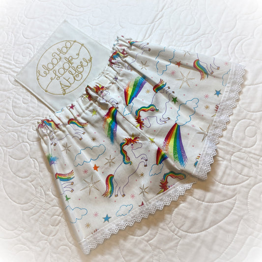 Shorts - Unicorns with Rainbow Tails White Anglaise Hemline and Elastic Waist