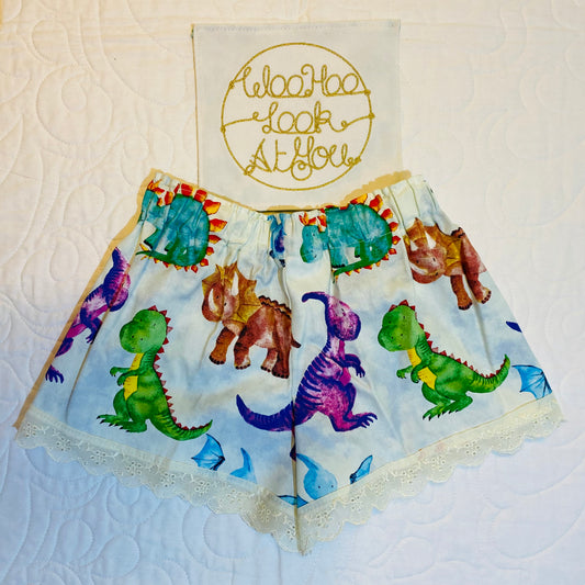 Shorts - Bright Coloured Dinosaurs with Anglaise Hemline and Elastic Waist