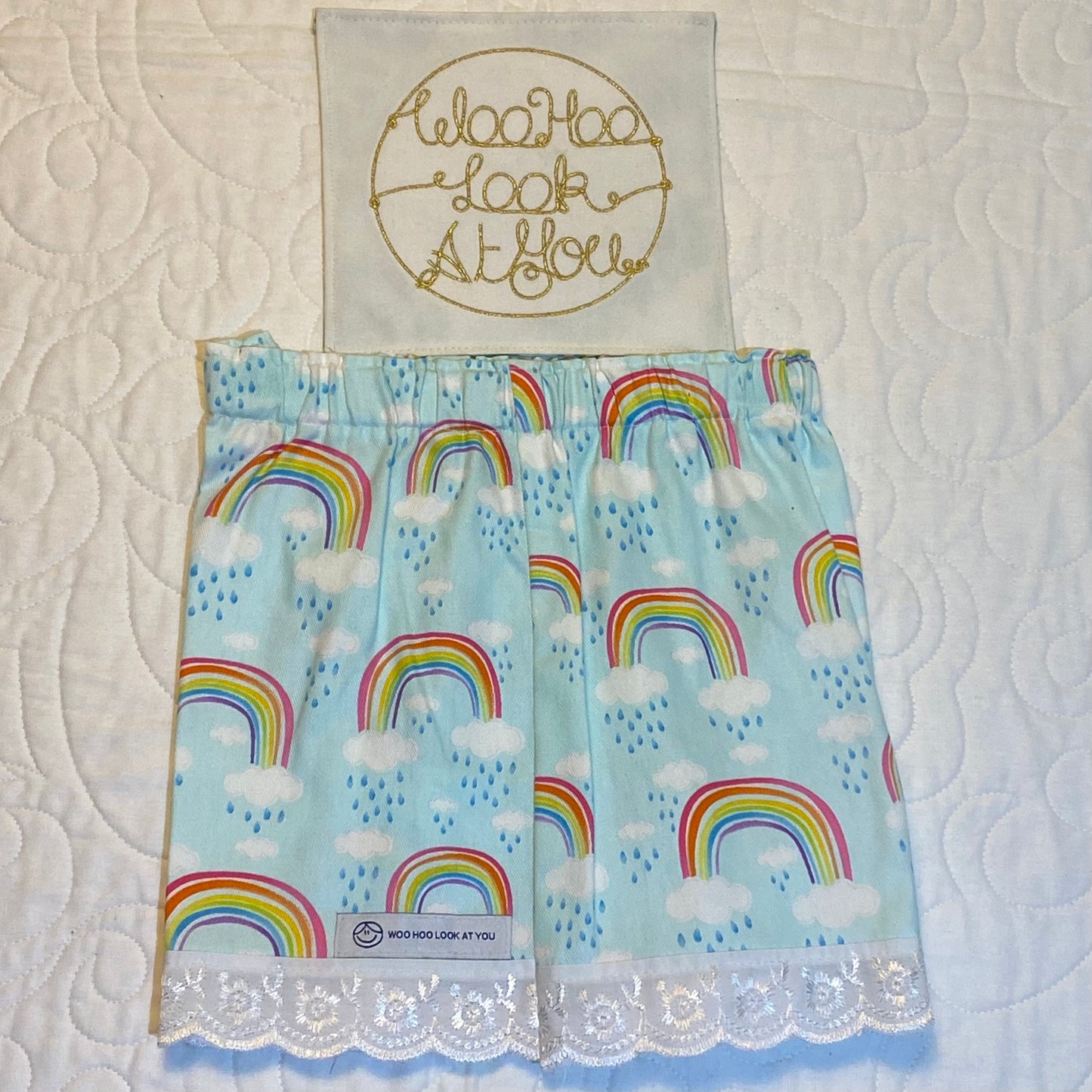 Shorts - Rainbows on Light Blue with White Anglaise Hemline and Elastic Waist