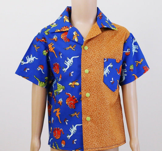 Shirt - Cartoon Dinosaurs on Blue Background with Mustard Contrasting Front Panel