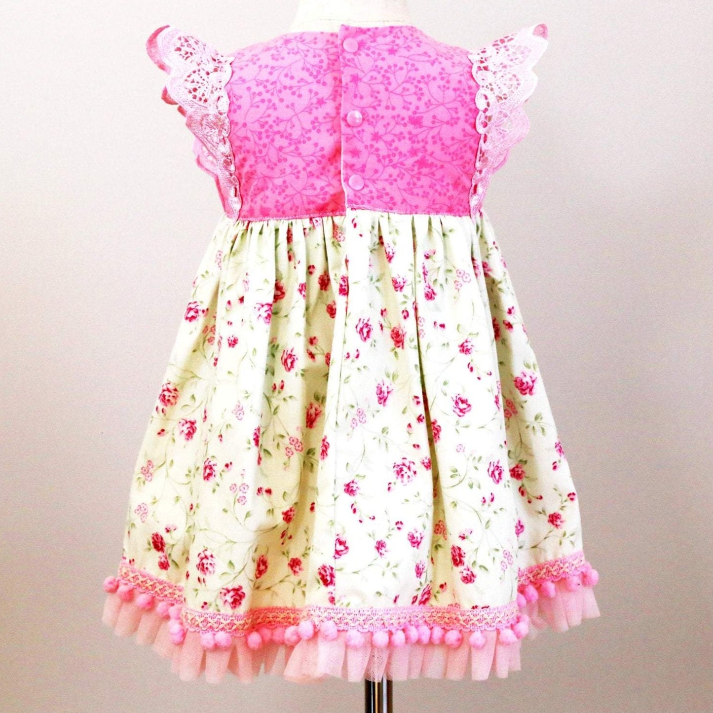 Dress - Maddie - Pink Bodice,  Pink Roses on Pale Mint Green Skirt with Light Pink Lace Flutters and Lace/Pom Pom Hemline